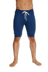 Navy blue cuffed yoga shorts with white drawstring and side pockets designed for comfortable activewear