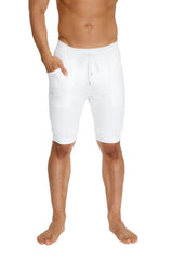 White cuffed yoga shorts with relaxed fit drawstring waistband and side pockets for comfortable wear