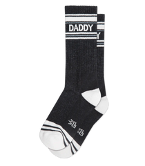 Black daddy crew socks with white stripes and bold text made from textured knit athletic material