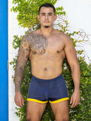 Little boy blue design dan shorts navy mesh athletic shorts in navy with bright yellow trim along the hem