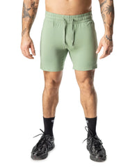 Mint green delta rugby short with elastic waistband and drawstring designed for athletic use