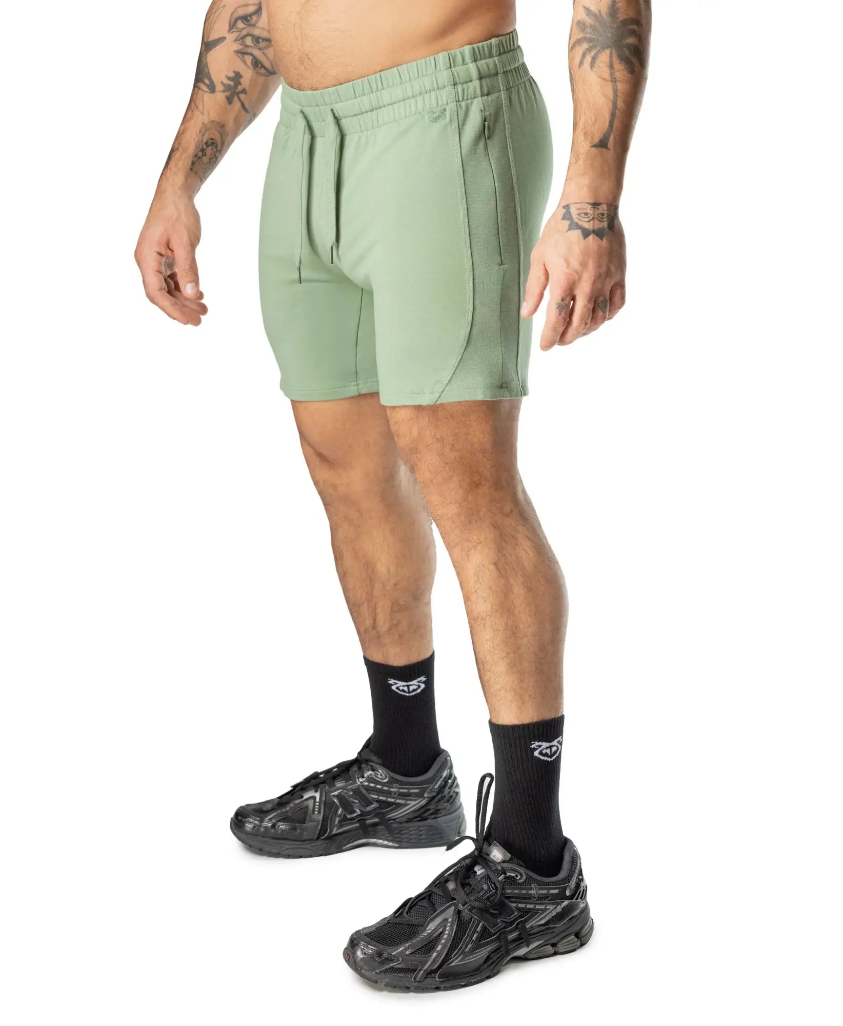 Mint green delta rugby short with drawstring waistband and side pockets designed for athletic use
