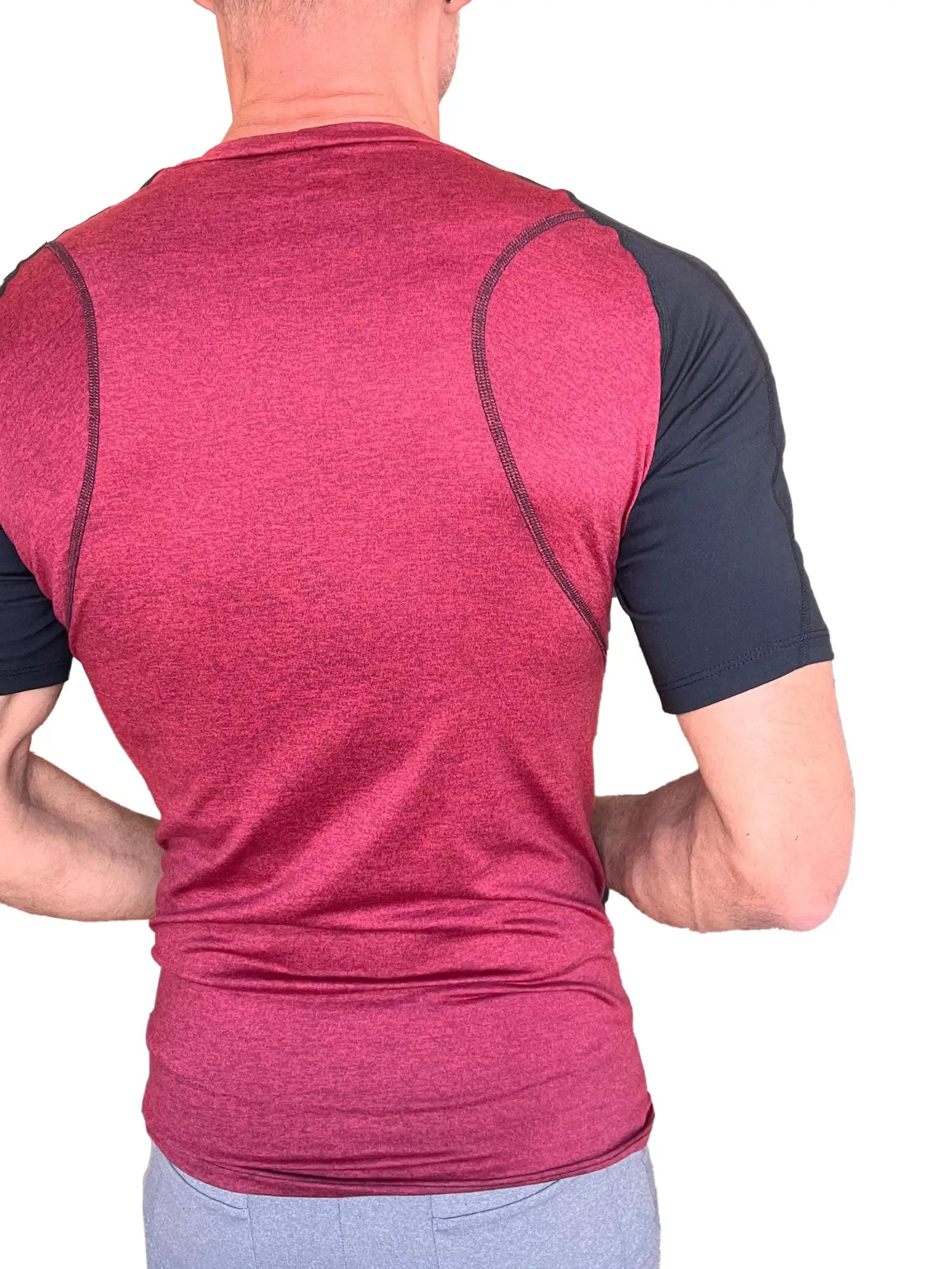 Designer raglan crew-neck tee with brick maroon and black sleeves heathered texture and contrasting shoulder seams