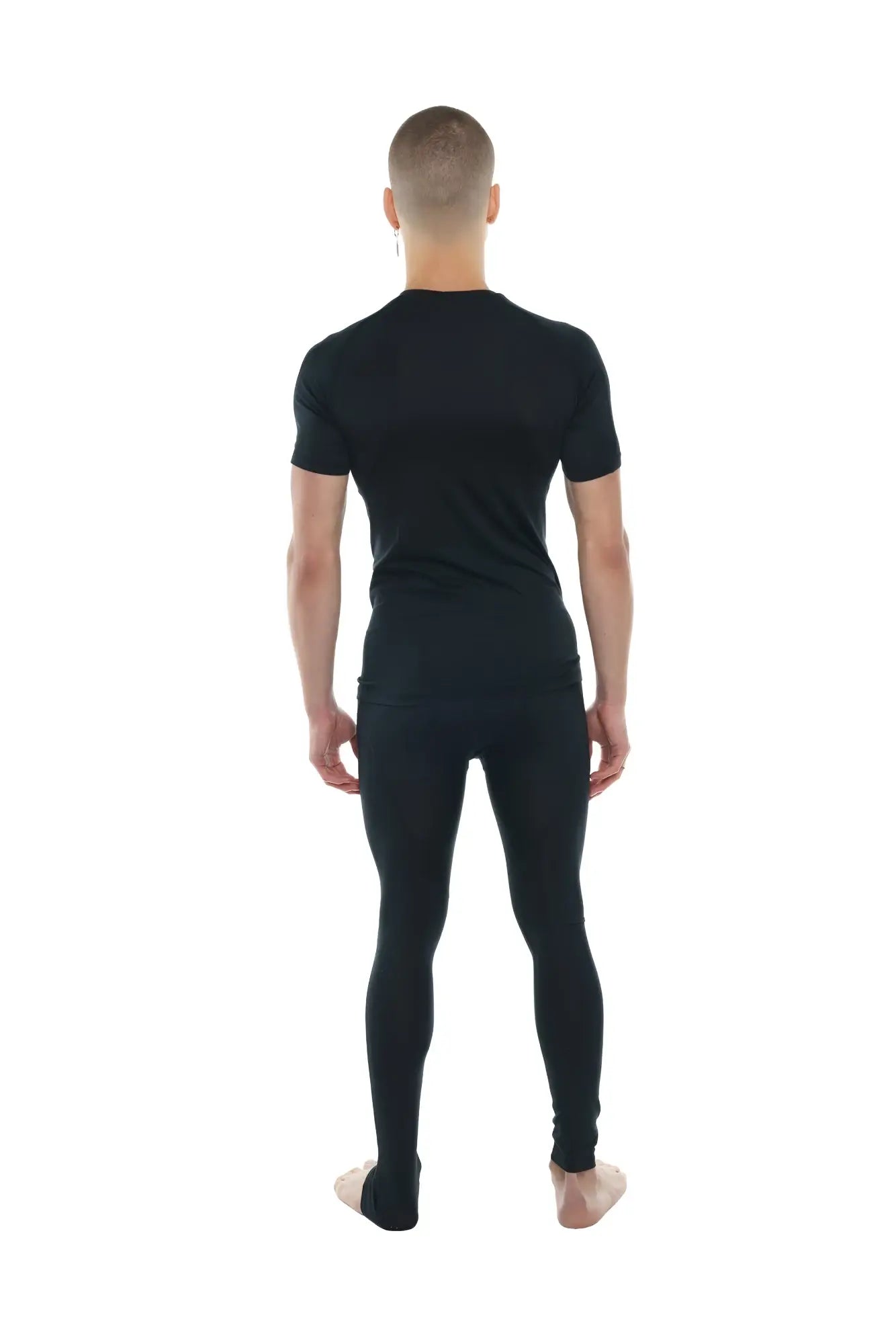 Black short-sleeved compression shirt and matching leggings set with raglan crew neck in carbon black