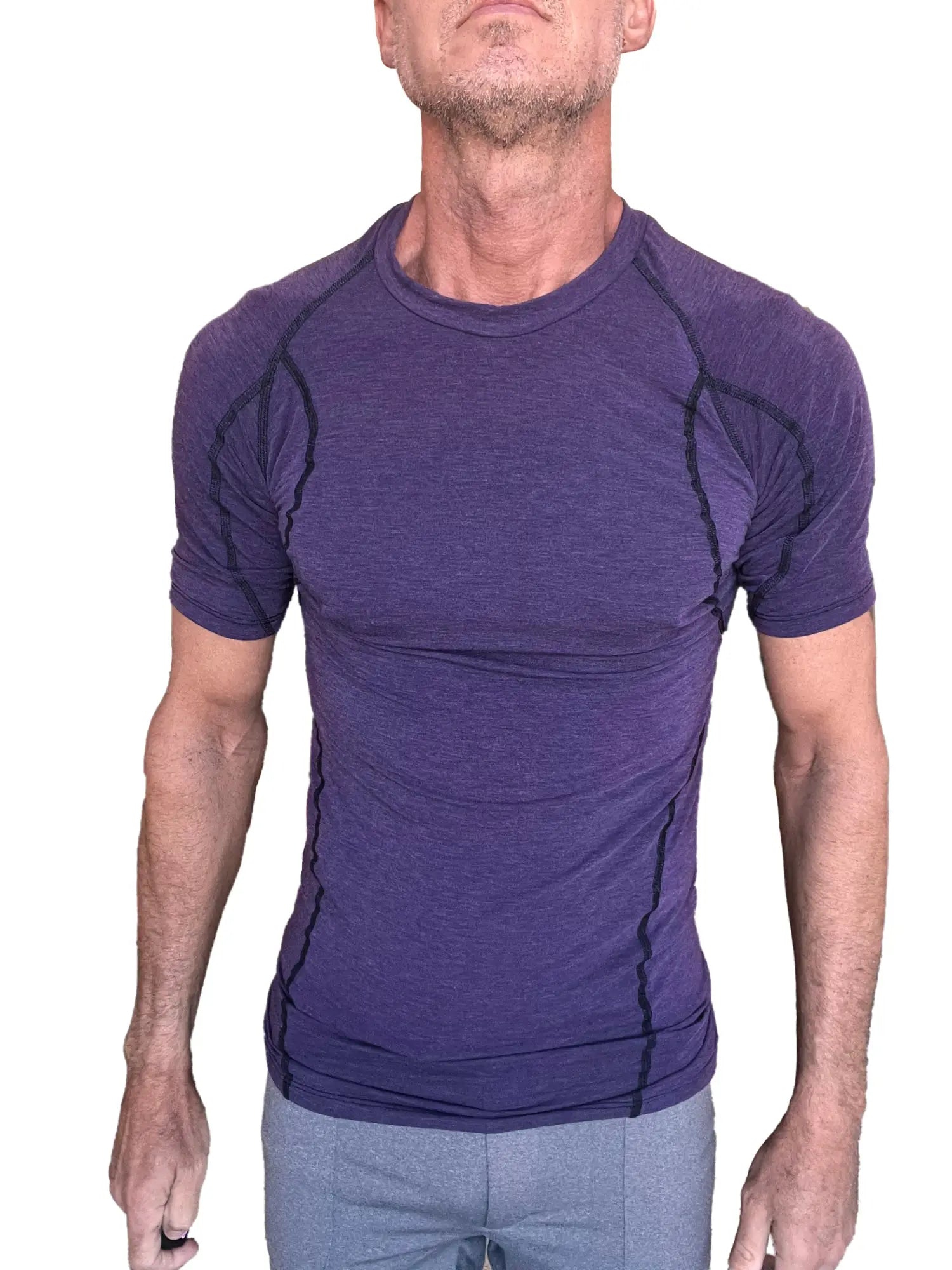 Designer raglan crew-neck tee in eggplant purple with black seam detailing and compression fit for active wear