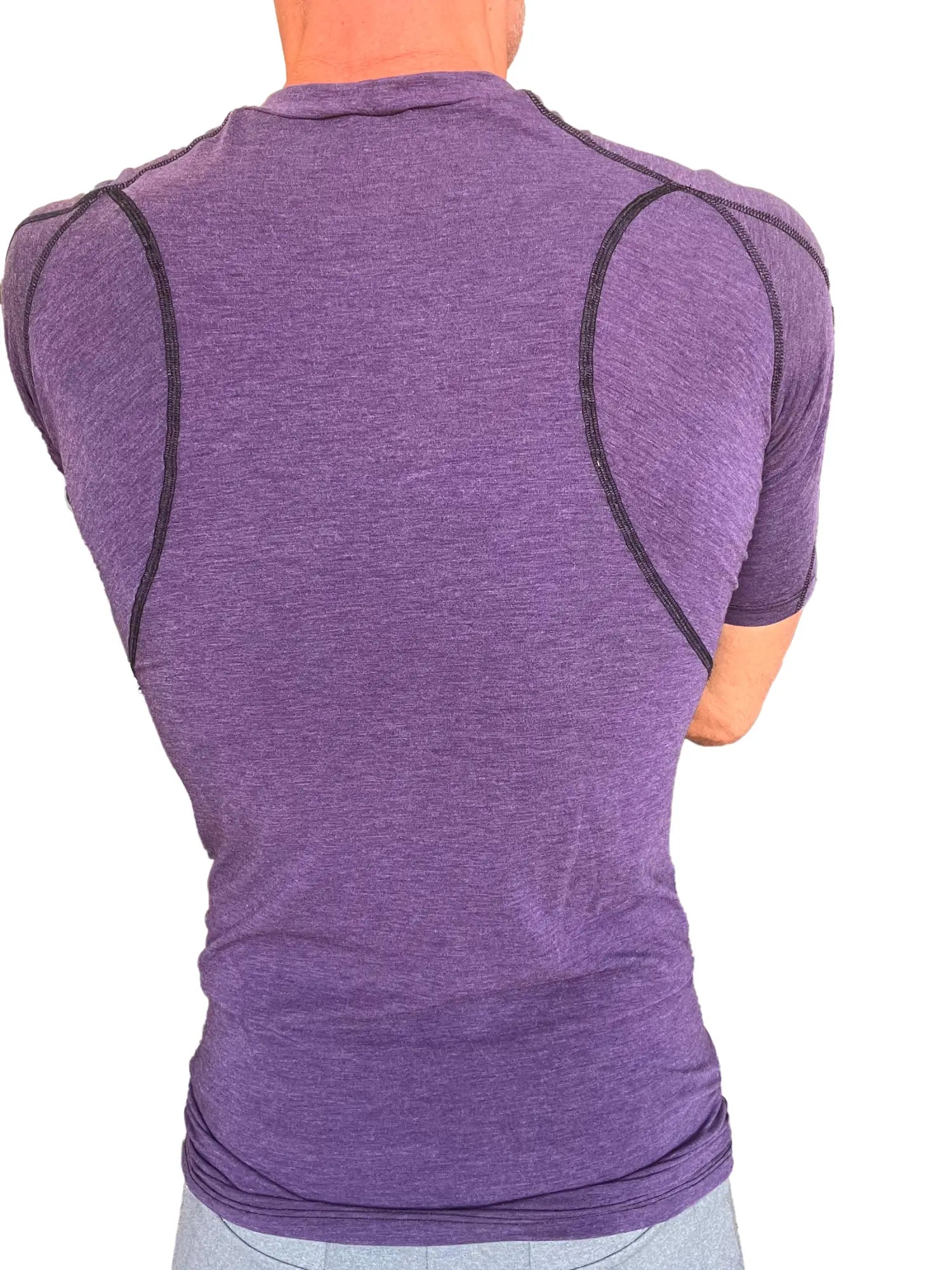 Designer raglan crew-neck tee in eggplant purple with purple heathered compression fabric and black seam detailing