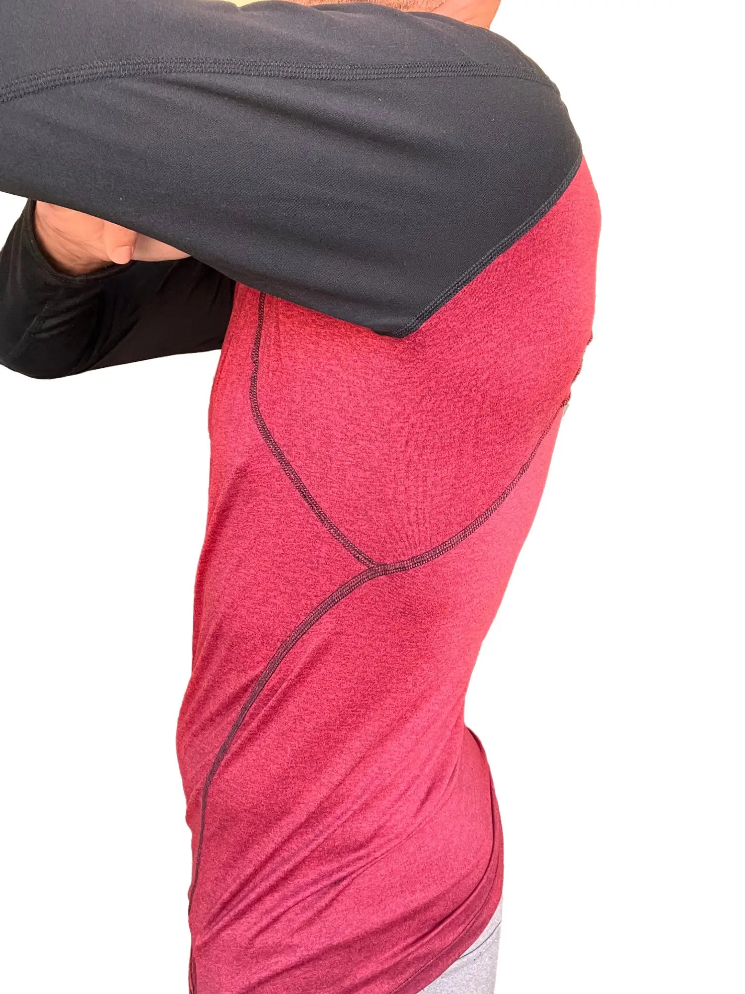 Red and black designer raglan crew-neck long sleeve tee with textured fabric and reinforced seams