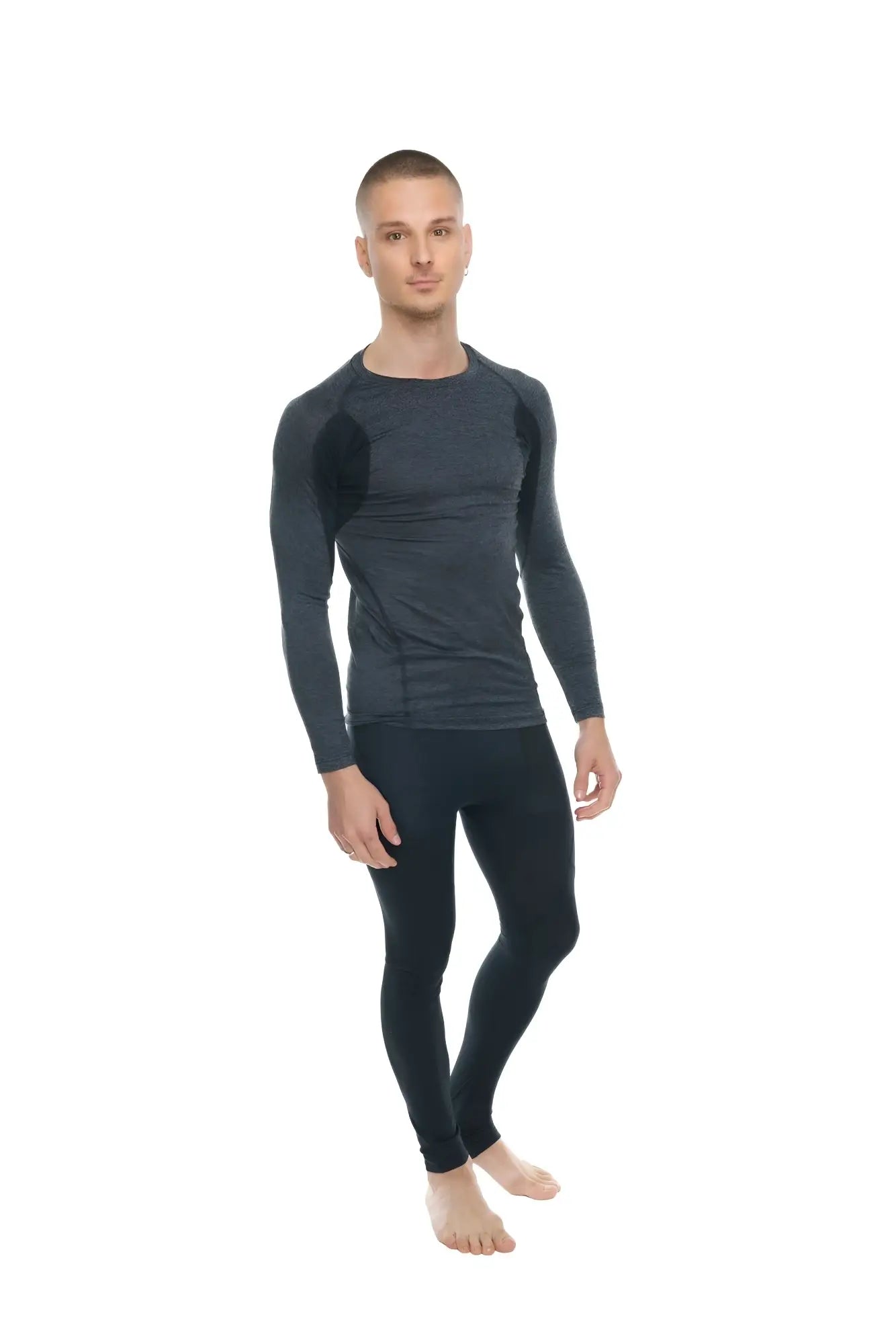 Black long-sleeved designer raglan crew-neck compression shirt with subtle textured panels on shoulders and torso