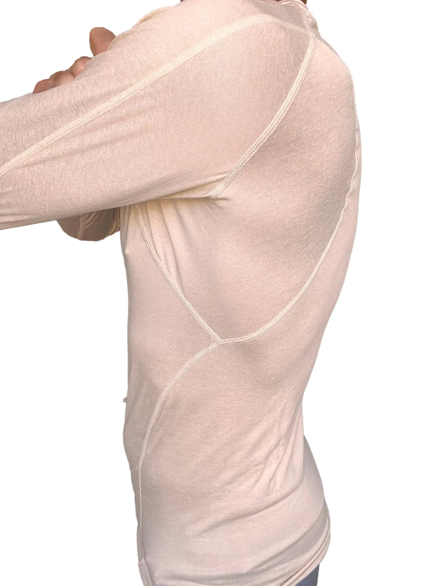 A beige long sleeve designer raglan crew neck tee with compression fit and visible seam detailing