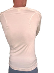 A cream-colored designer raglan crew-neck tee long sleeve with fitted design and subtle seam detailing in sand beige