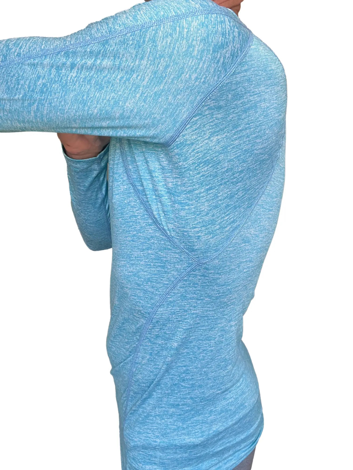 Light blue heathered long sleeve athletic shirt with subtle seam detailing and raglan crew neck design