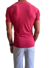 Designer raglan crew-neck tee raspberry is a vibrant fuchsia short-sleeved fitted athletic top with textured fabric and seams