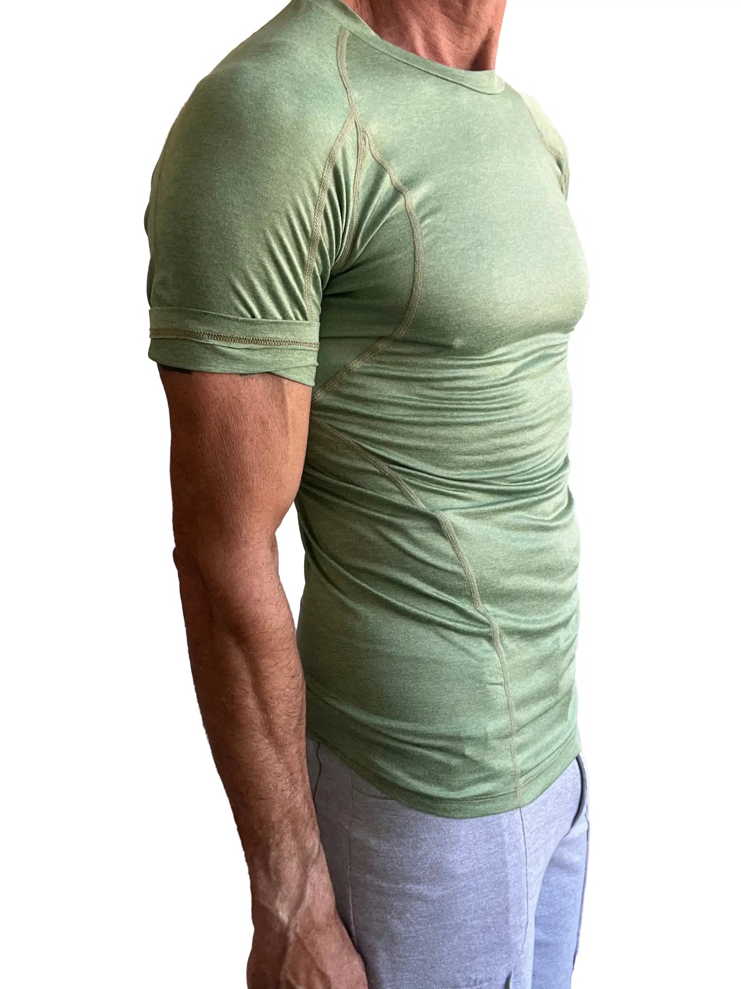 Designer raglan crew neck tee in sage green is a fitted short sleeve athletic shirt with subtle seam detailing and ribbed cuffs