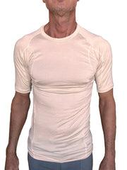 Beige short-sleeved designer raglan crew-neck tee with fitted moisture-wicking fabric and subtle seam detailing