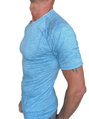 Light blue heathered short sleeve athletic shirt with subtle seam detailing in designer raglan crew neck style