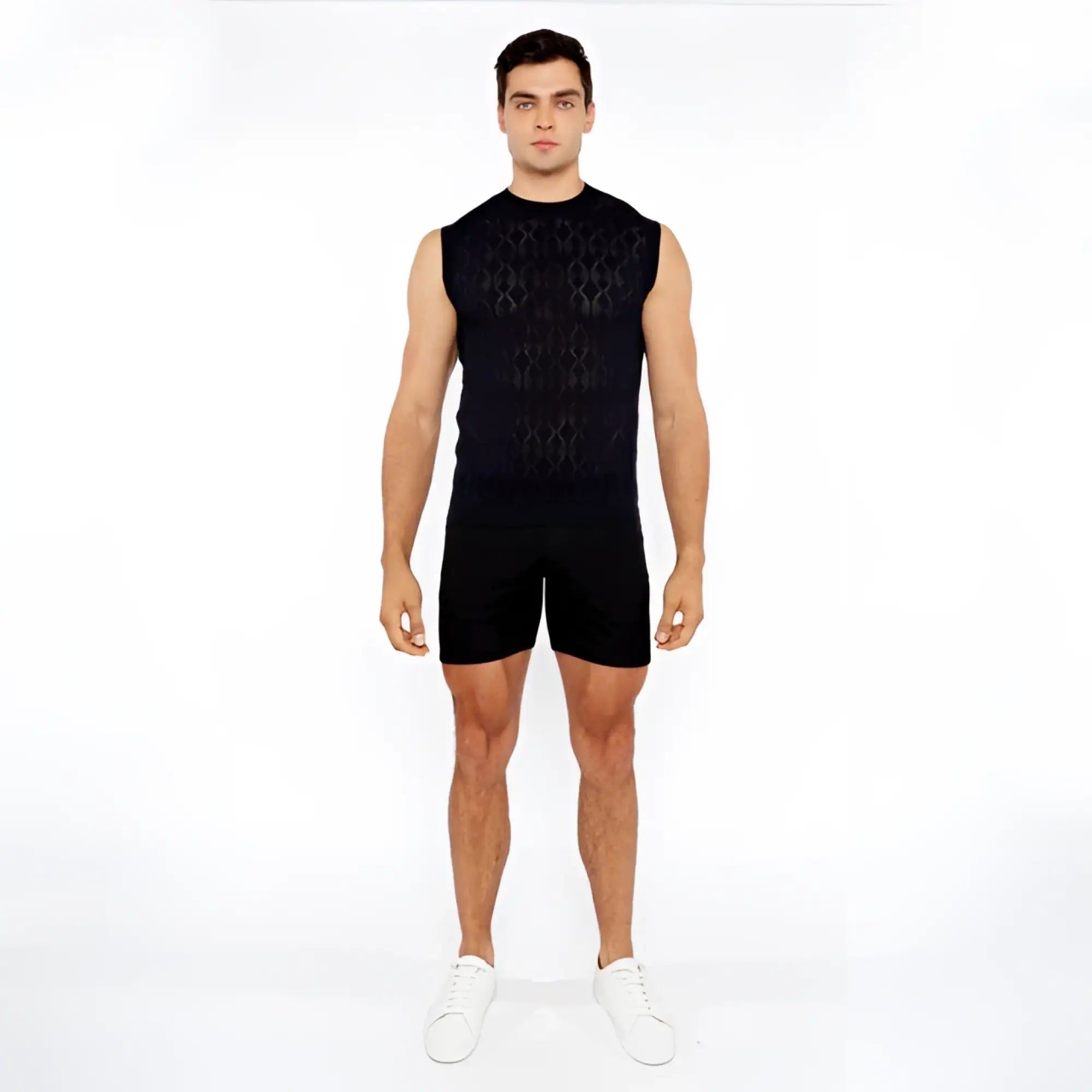 Black sleeveless knit vest with intricate diamond pointelle geometric pattern perfect for layering and style
