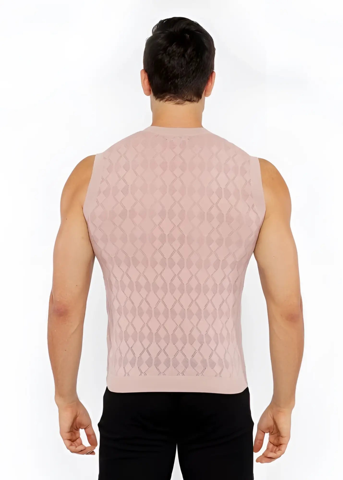 A pink diamond pointelle knit vest featuring a sleeveless design and textured diamond pattern