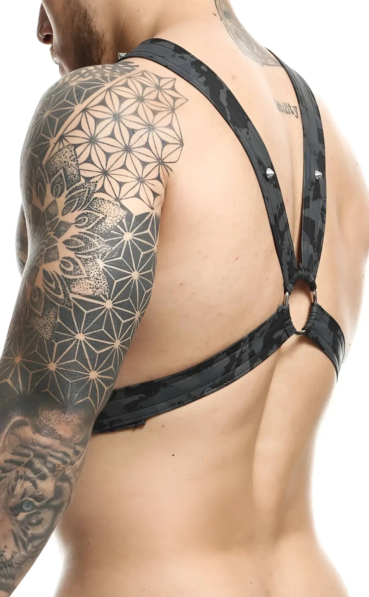 Dngeon cross chain harness in black camouflage pattern with metallic hardware for edgy fashion looks