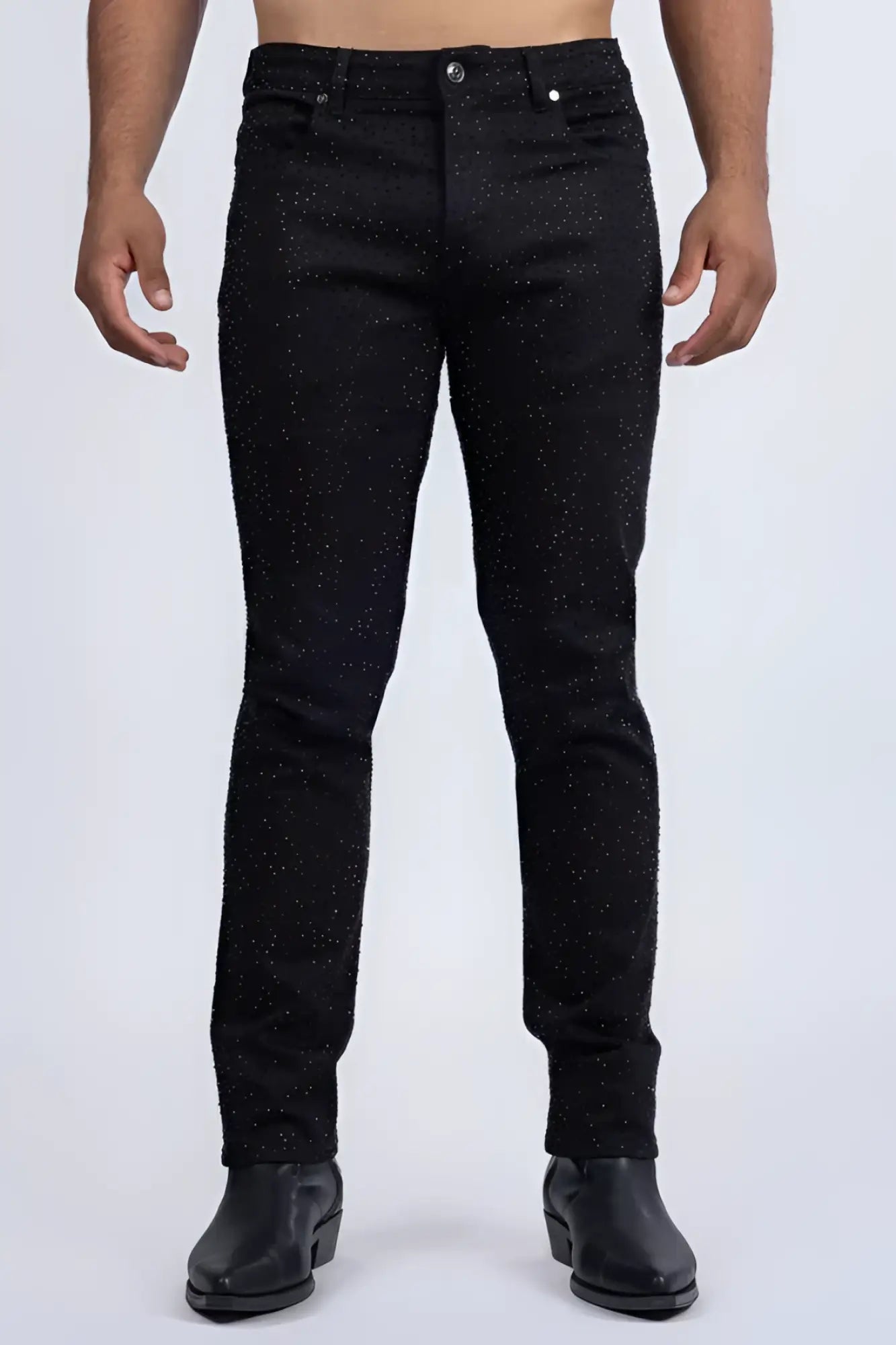 Black denim dolorosa rhinestone jeans featuring a subtle glittery speckle pattern on the front side