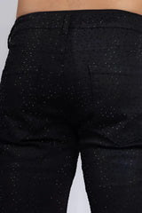 Dolorosa rhinestone jeans are black denim with a subtle glittery dot pattern across the fabric