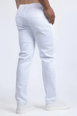 White dolorosa rhinestone jeans featuring subtle dotted pattern in a soft denim fabric