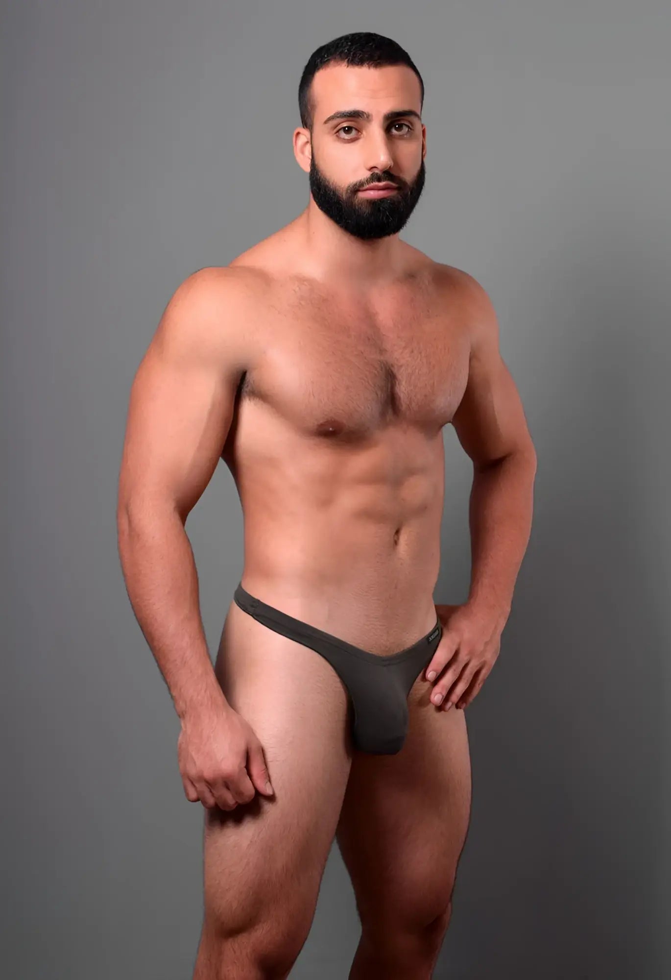 Dark gray seamless form-fitting thong with narrow waistband and smooth fabric by doreanse in smoke color