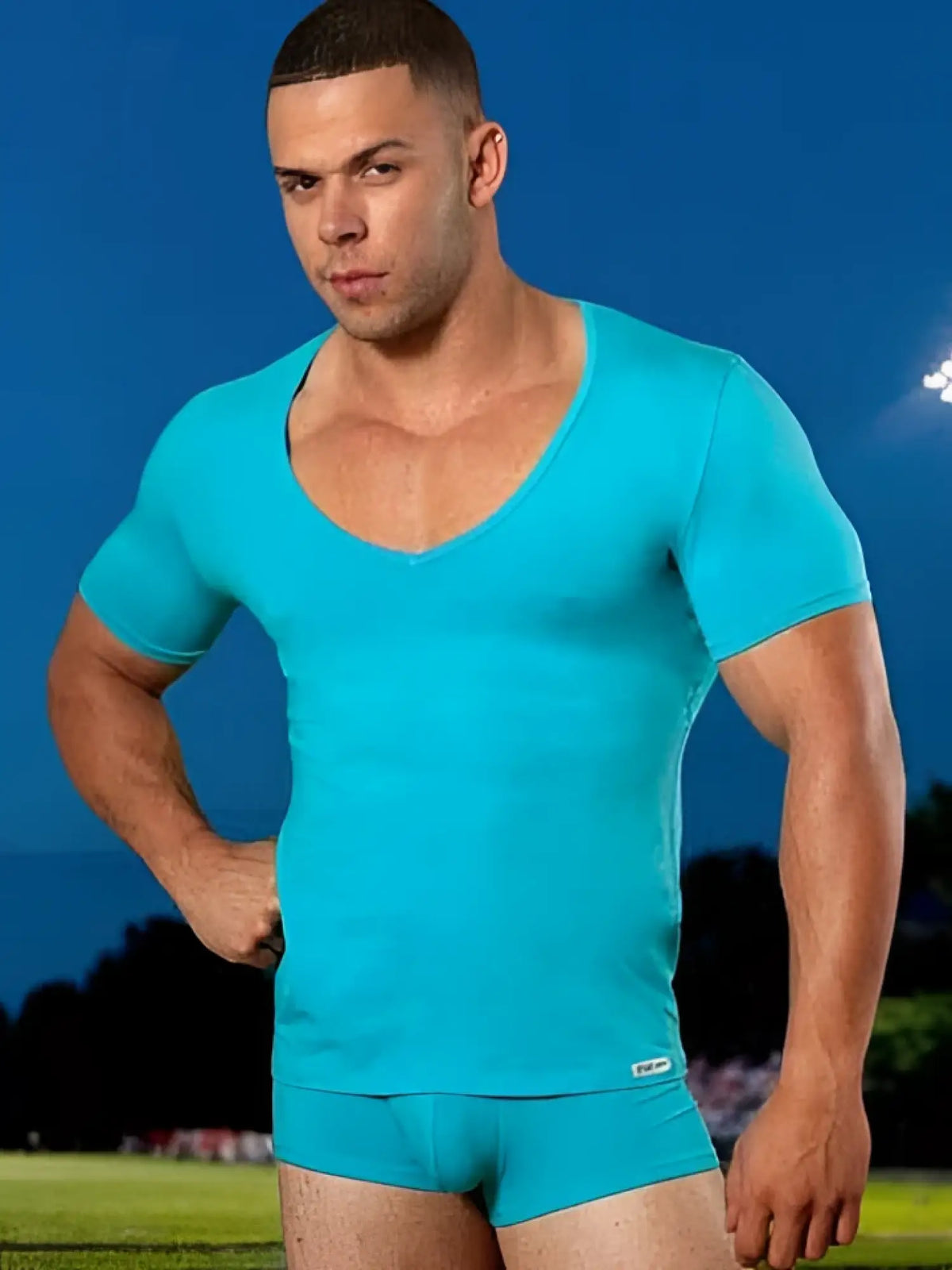 Doreanse deep v neck short sleeved turquoise athletic shirt size 2xl made from breathable fabric