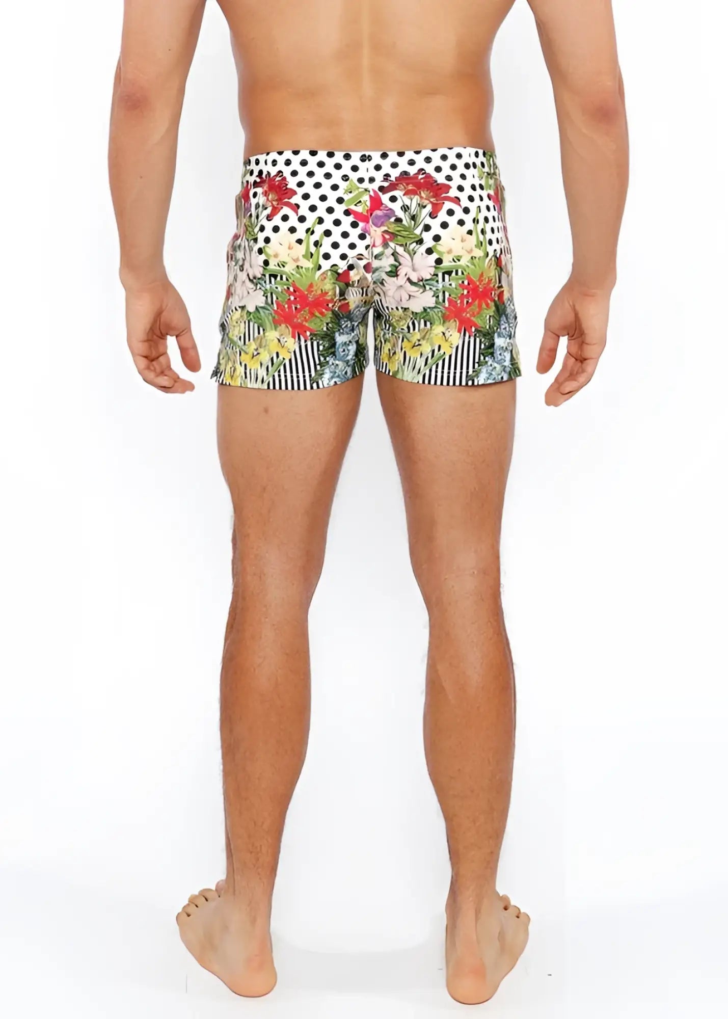 Dots abstract printed swim shorts featuring vibrant floral and polka-dot patterns with red pink green and yellow blossoms
