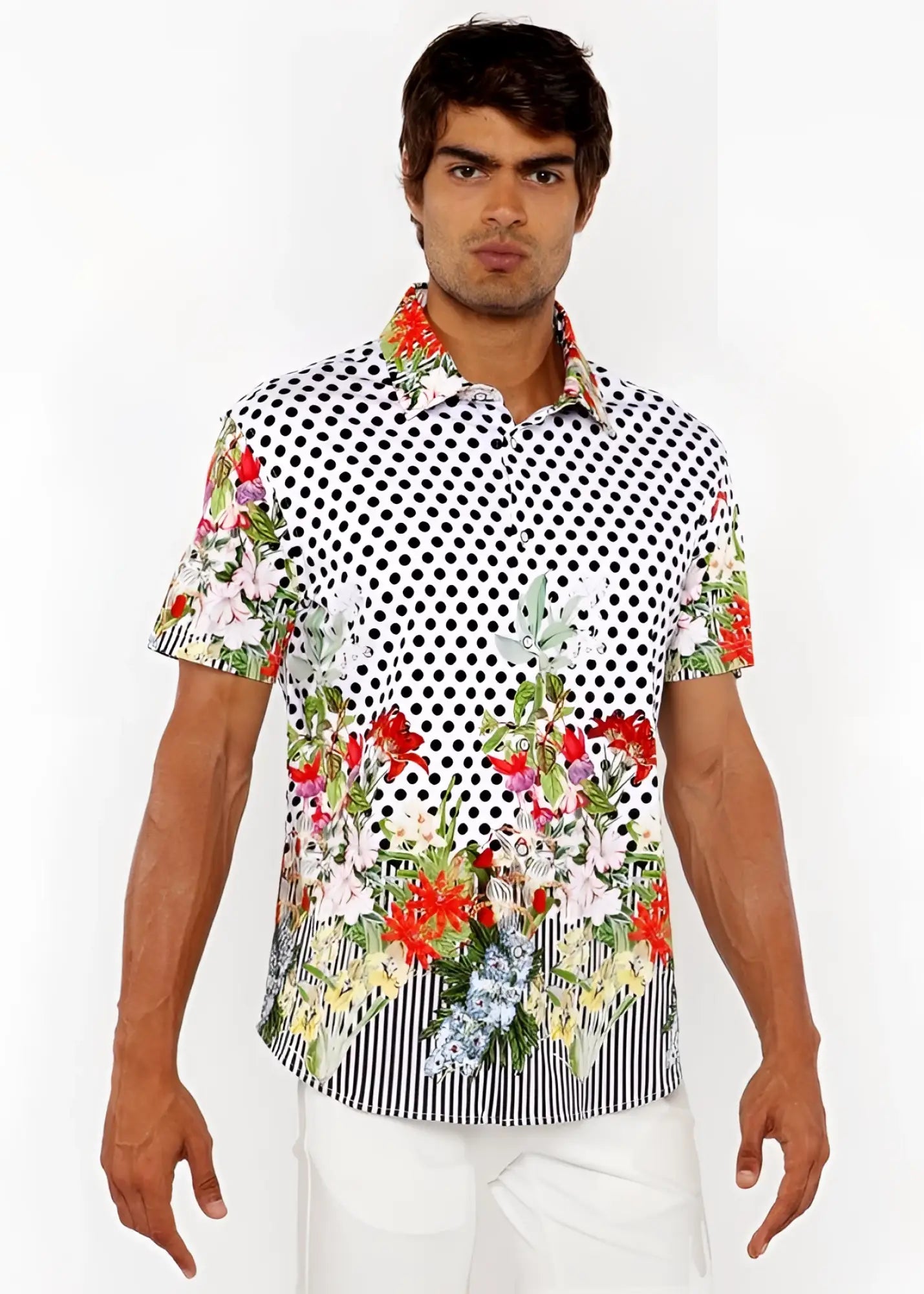 A vibrant short-sleeved dots abstract s s woven modal border shirt with black polka dots and colorful floral accents