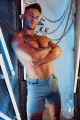 Light blue denim Down Low shorts with button closure and side pockets for casual wear