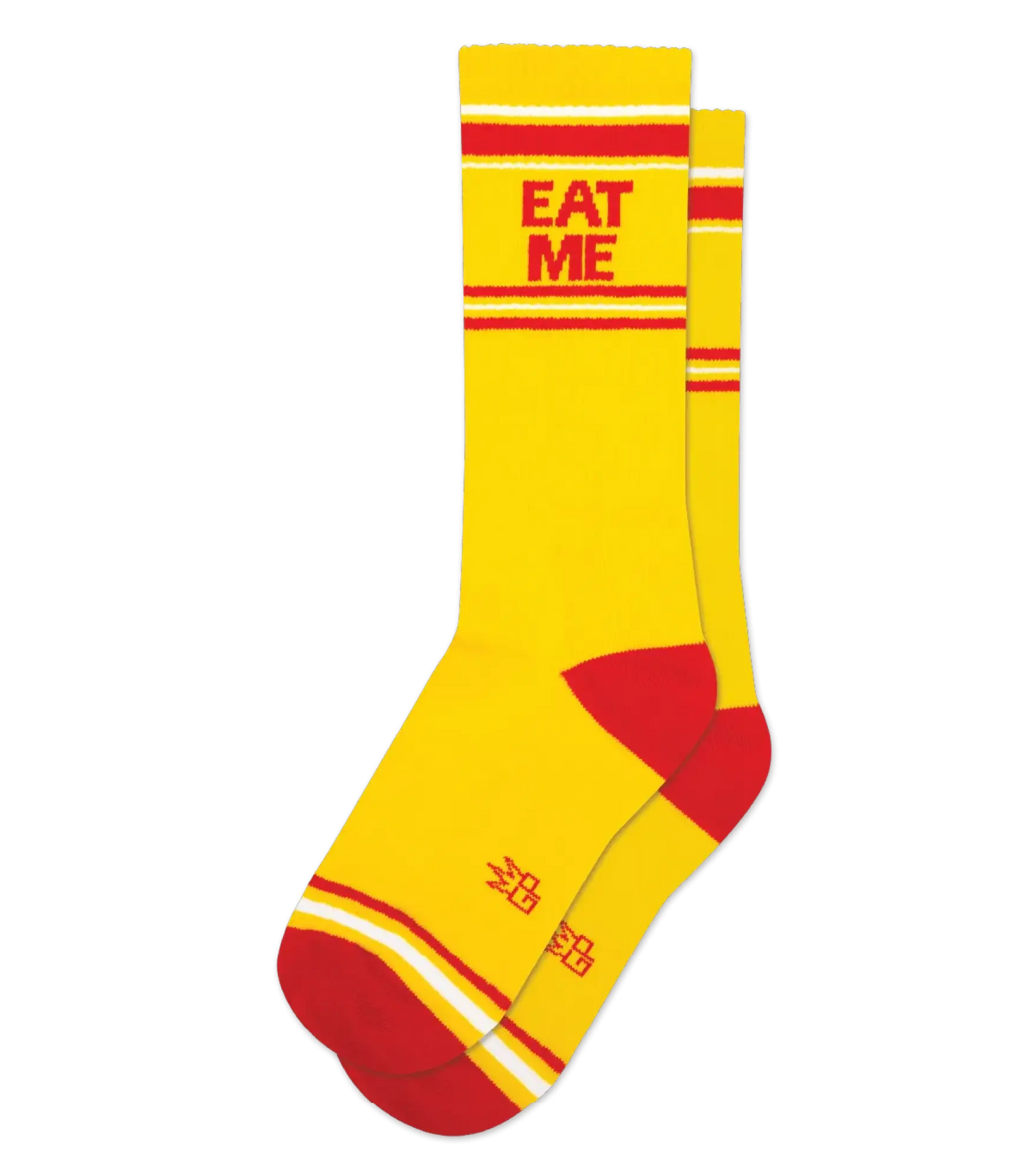 Eat me crew socks in bright yellow with bold red stripes and red eat me text on the cuff with matching toe and heel