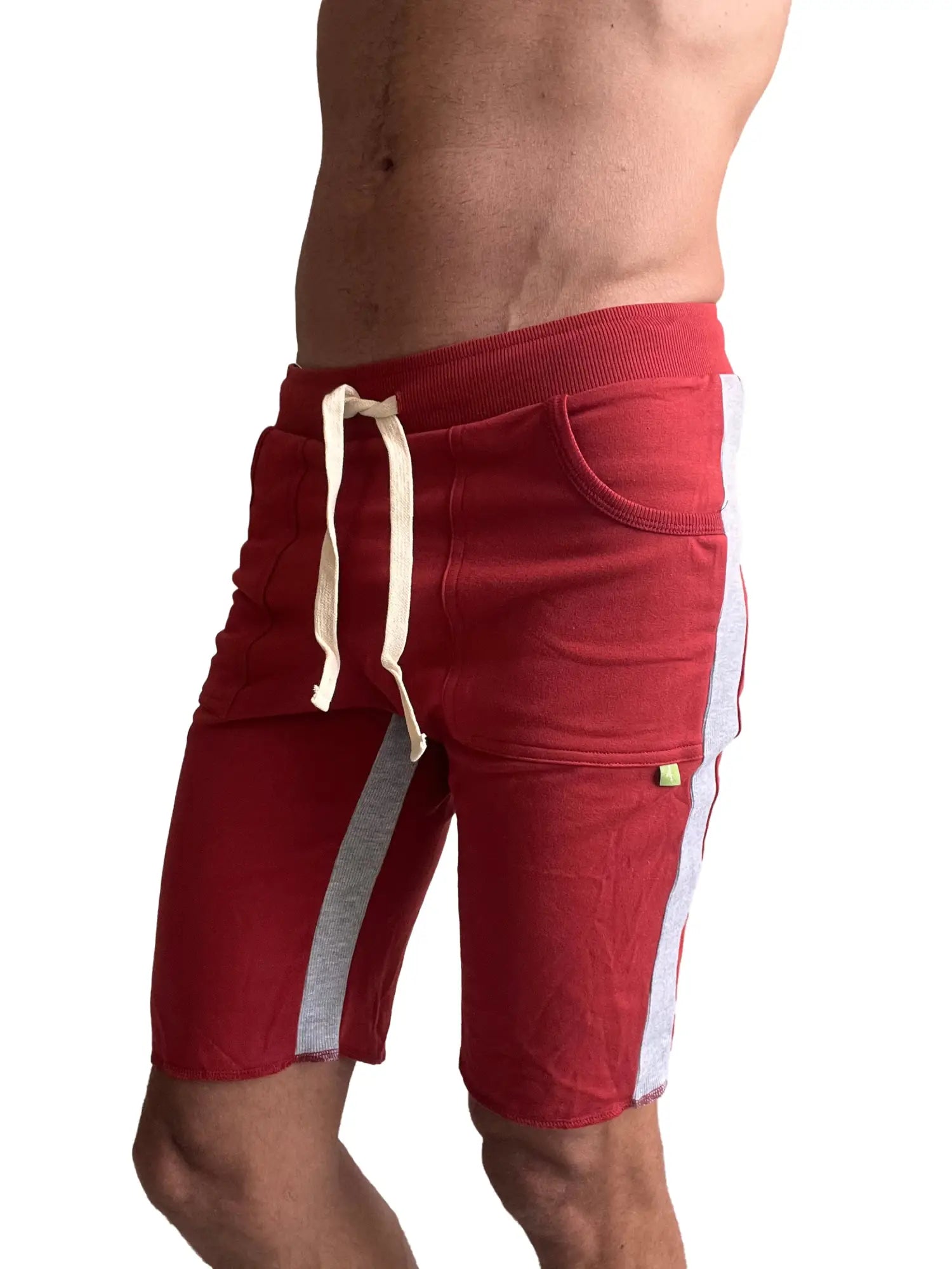 Eco-track short cinnabar with grey side stripes featuring a drawstring waistband in red athletic fabric