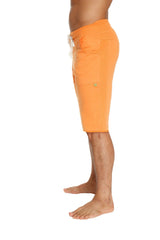 Eco-track short in sun orange features bright orange mid-thigh length shorts with drawstring waist and side pockets