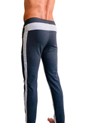 Dark heathered blue eco-track and yoga sweat pant with light gray and black side stripes and white ribbed waistband