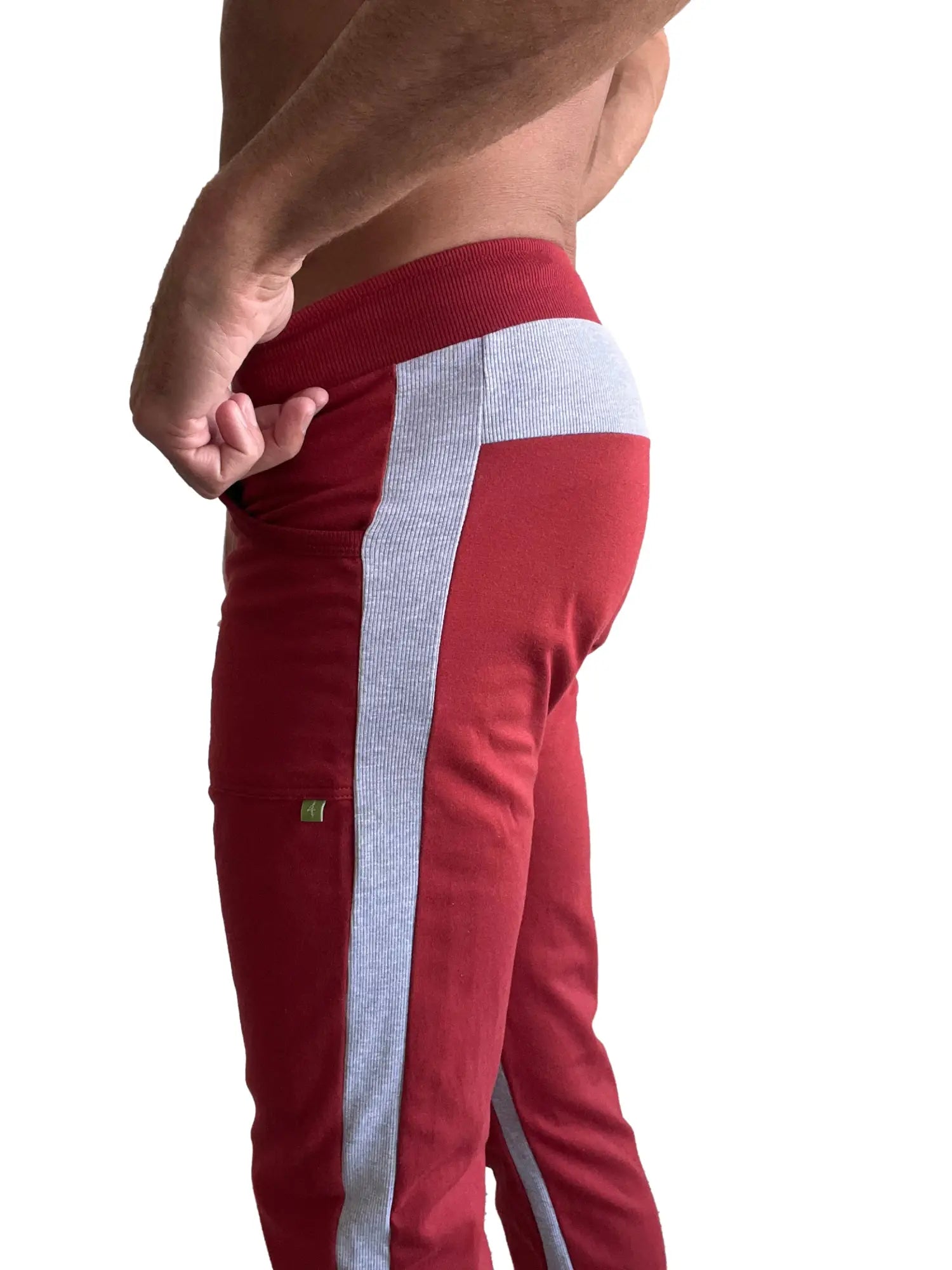 Eco track and yoga sweat pant in cinnabar red with gray vertical ribbed stripe and matching gray waistband trim