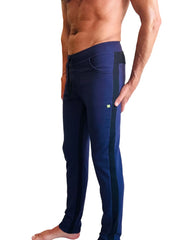 Eco-track and yoga sweat pant in navy blue with black side stripes and a small green logo on the thigh