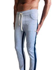 Eco-track and yoga sweat pant heather grey with blue featuring light gray heathered fabric navy side stripes and cream drawstrings