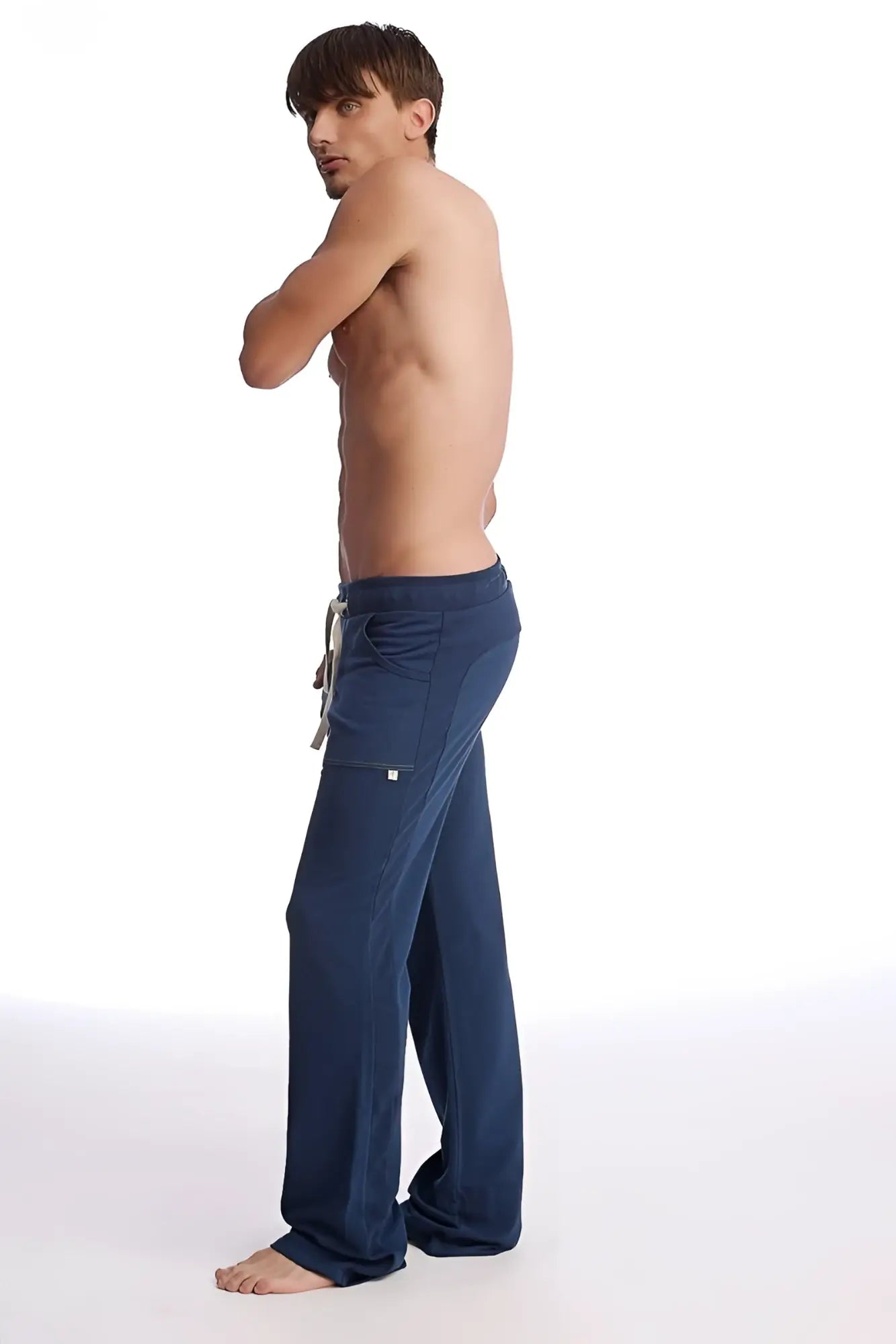 Navy blue eco-track and yoga sweat pant with drawstring waist and side pockets in loose fit design