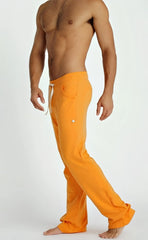 Orange eco-track and yoga sweat pant with white drawstring and side pockets designed for athletic use