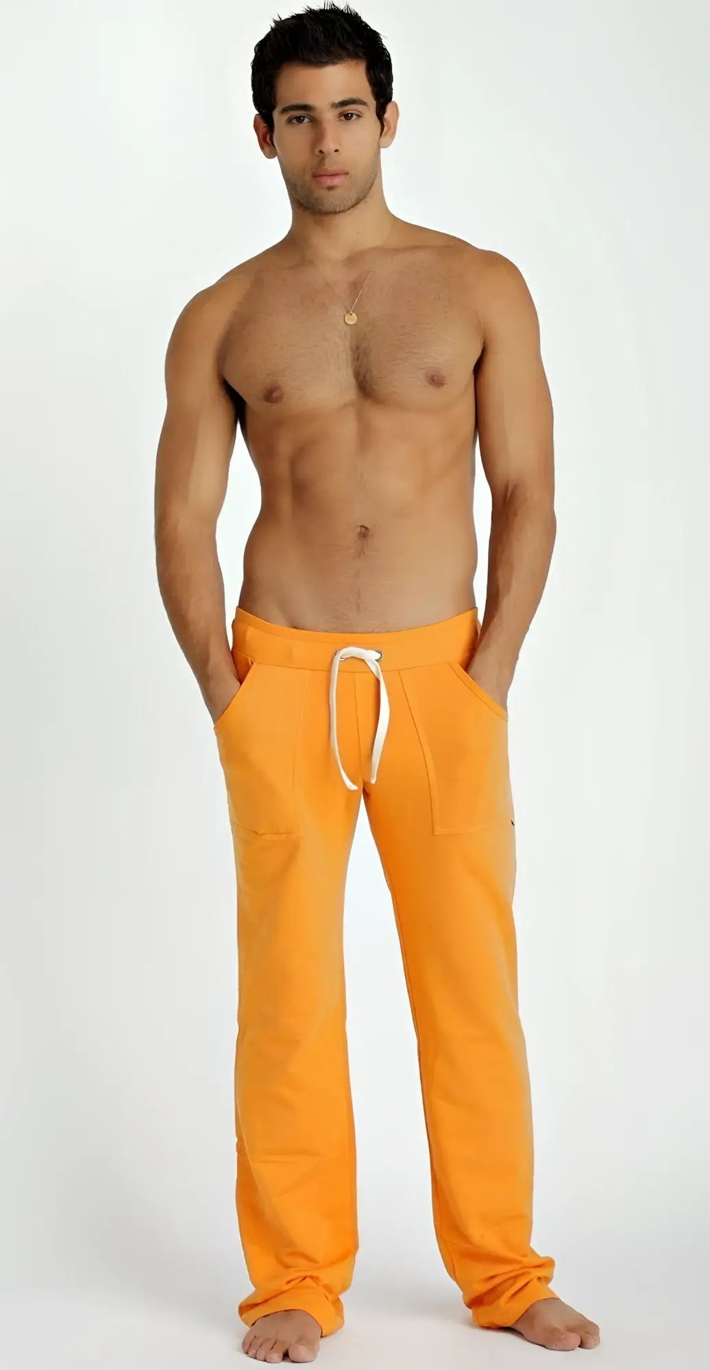 Eco-track and yoga sweat pant in sun orange with white drawstring waistband made from sustainable fabric