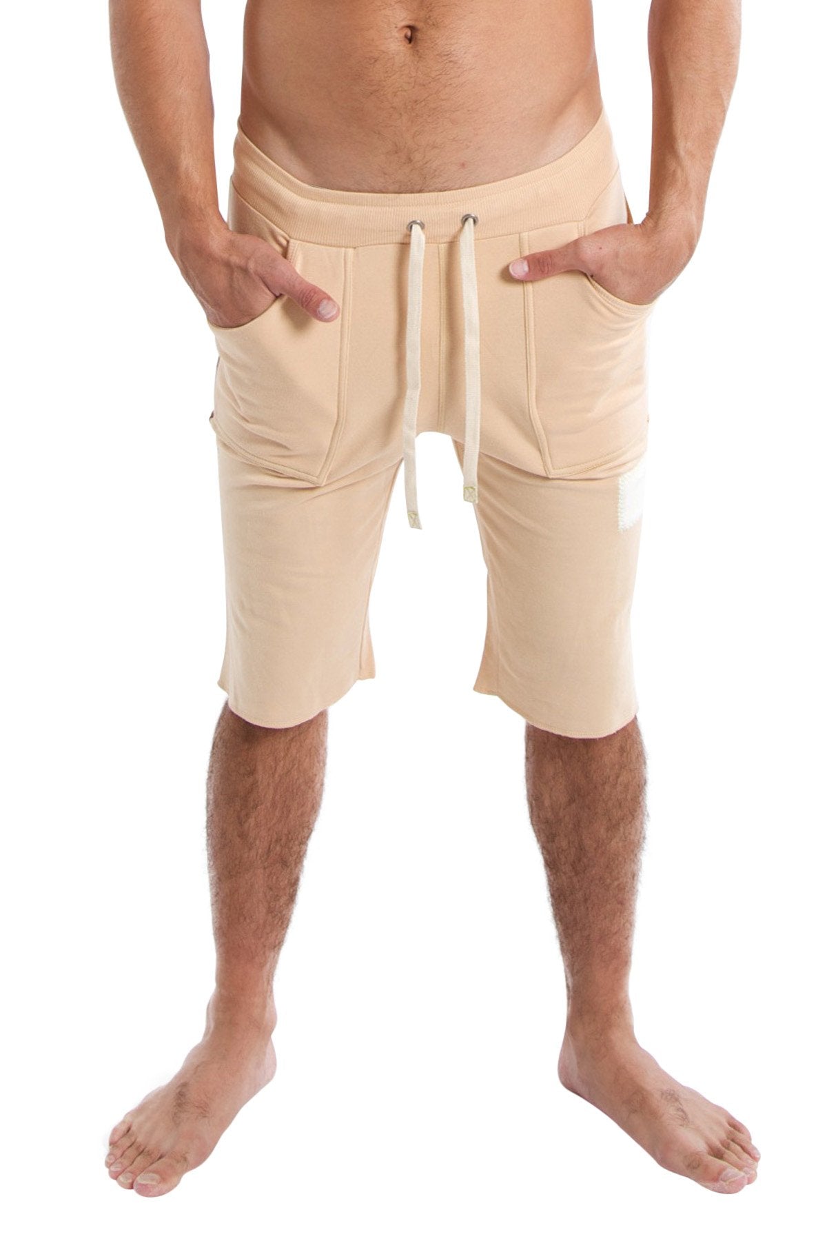 Beige edge eco-track shorts with drawstring waist side pockets and relaxed fit in sand with chocolate details