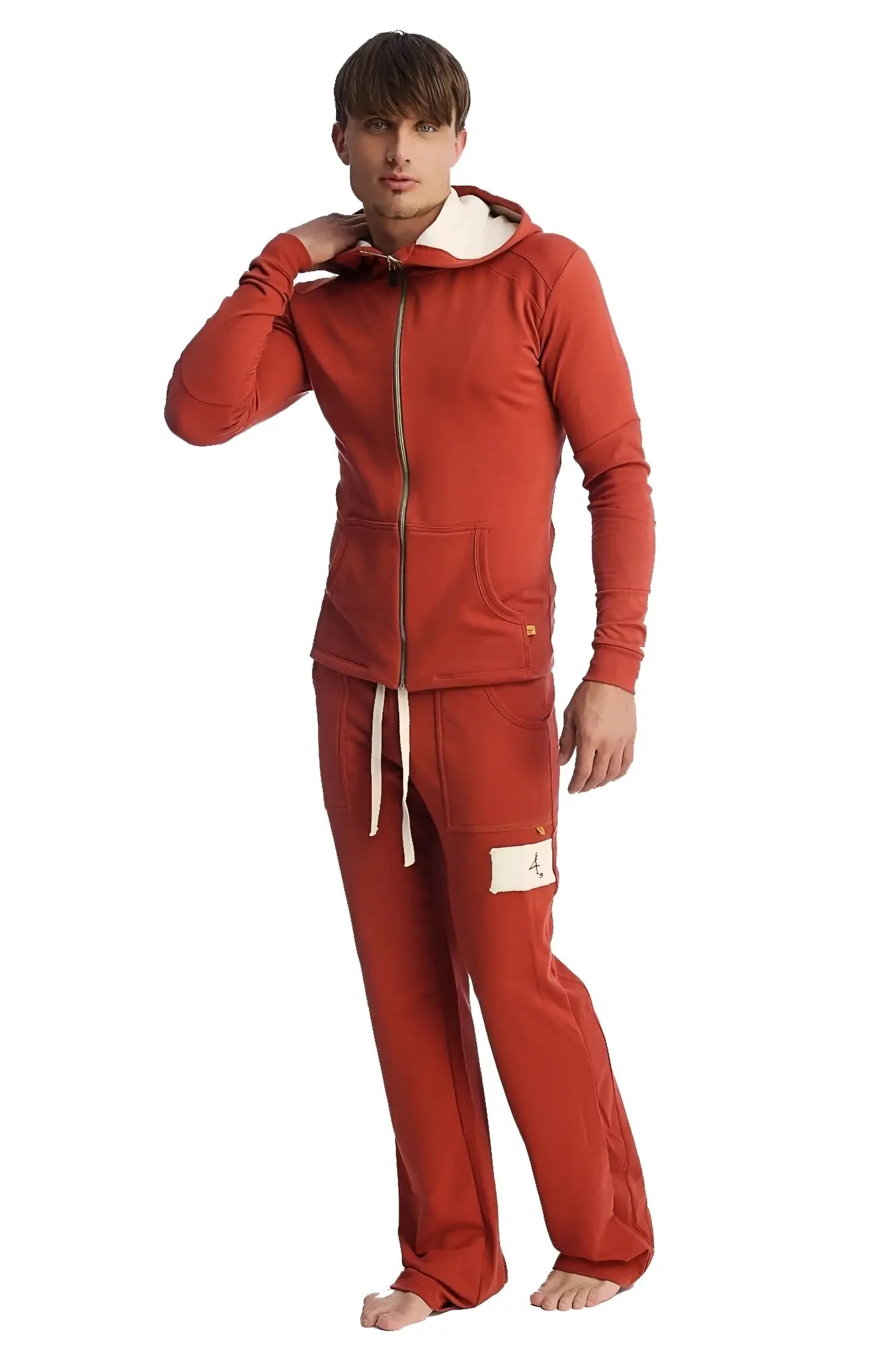 Red hooded sweatshirt with gold zipper and white drawstrings paired with cinnabar edge eco-track and yoga sweat pant
