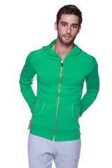 Edge form-fit crossover yoga track performance hoodie in bamboo green with gold-toned zipper and front pockets