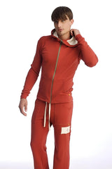 Red hooded sweatshirt with cream inner lining and matching drawstring pants from edge form-fit cinnabar collection