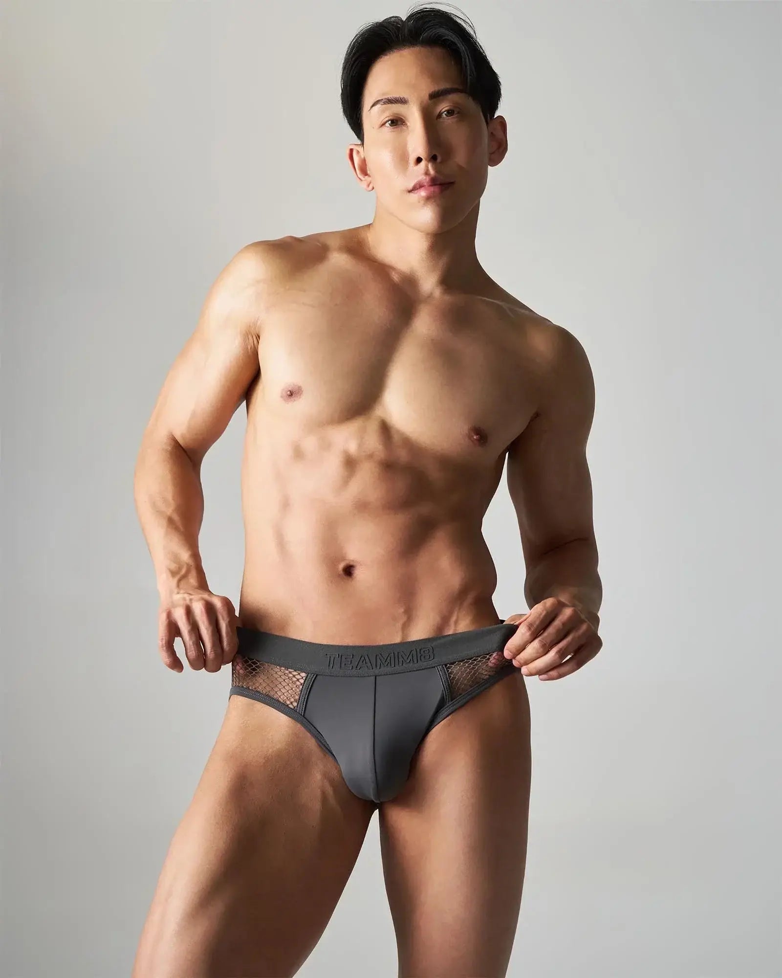 Dark gray calvin klein edge net brief with breathable mesh side panels for comfortable everyday wear