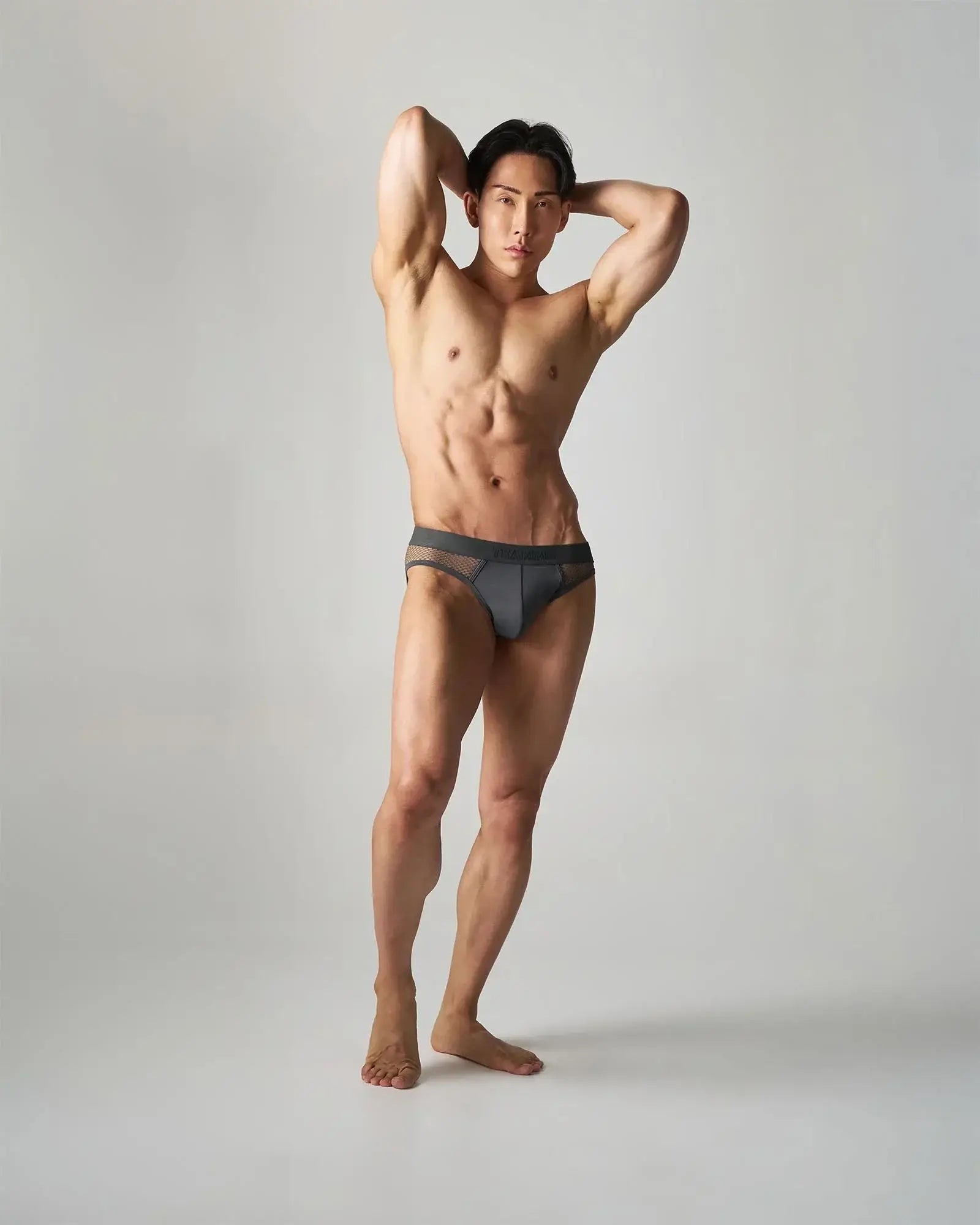 Dark gray edge net brief with mesh trim made from breathable fabric for comfortable everyday wear