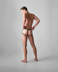 Black lace thong with a supportive contoured design from edge net jock thong collection shown from the back side
