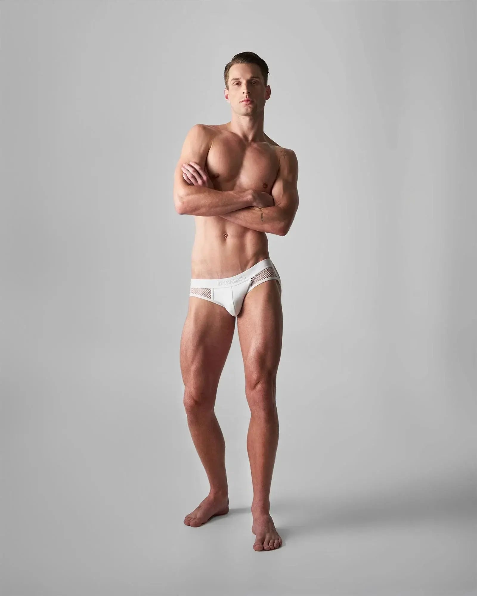 White mesh-trimmed briefs in edge net jock thong style featuring breathable mesh panels and white fabric