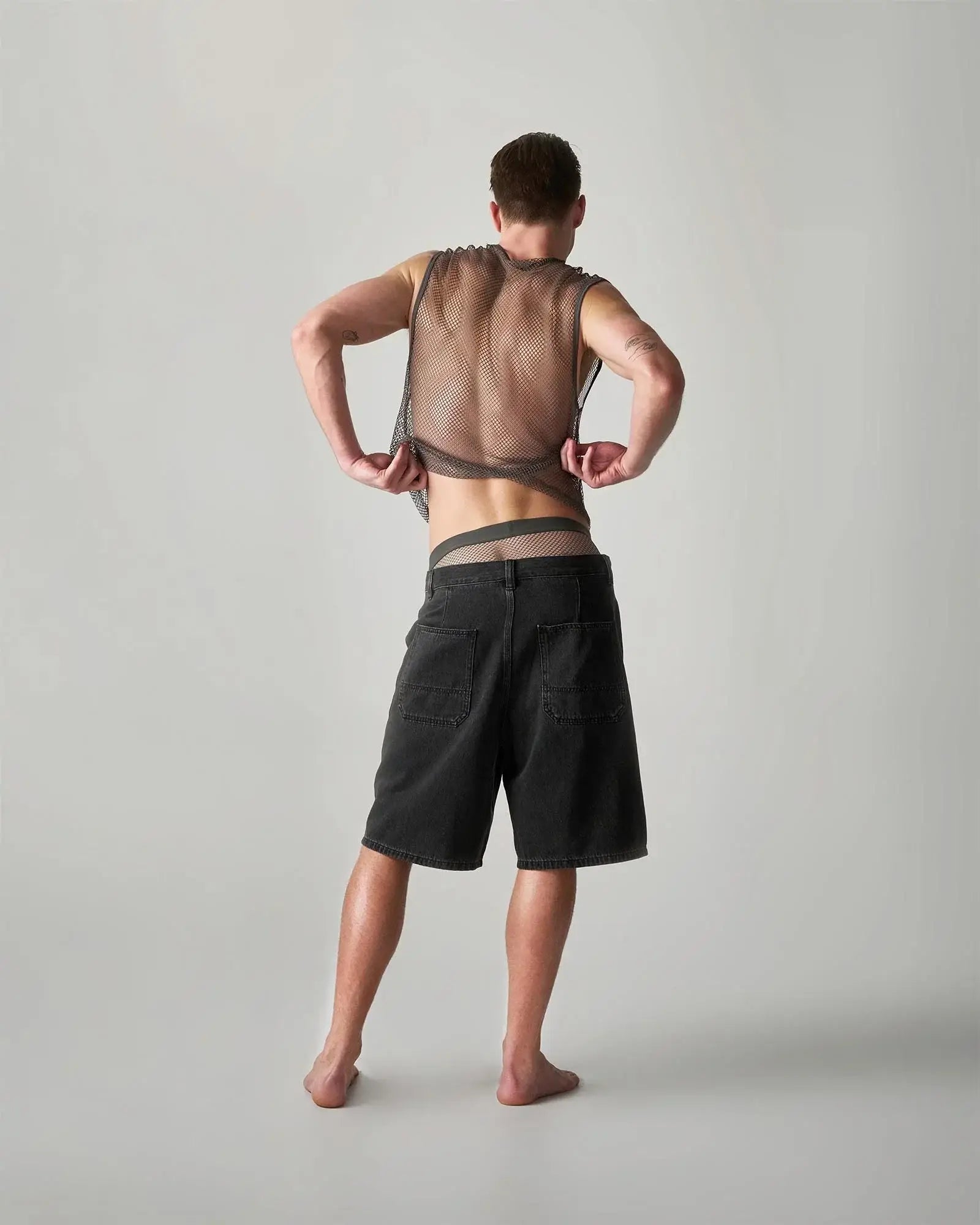 Black edge net mesh muscle tank with adjustable straps and sheer semi transparent design