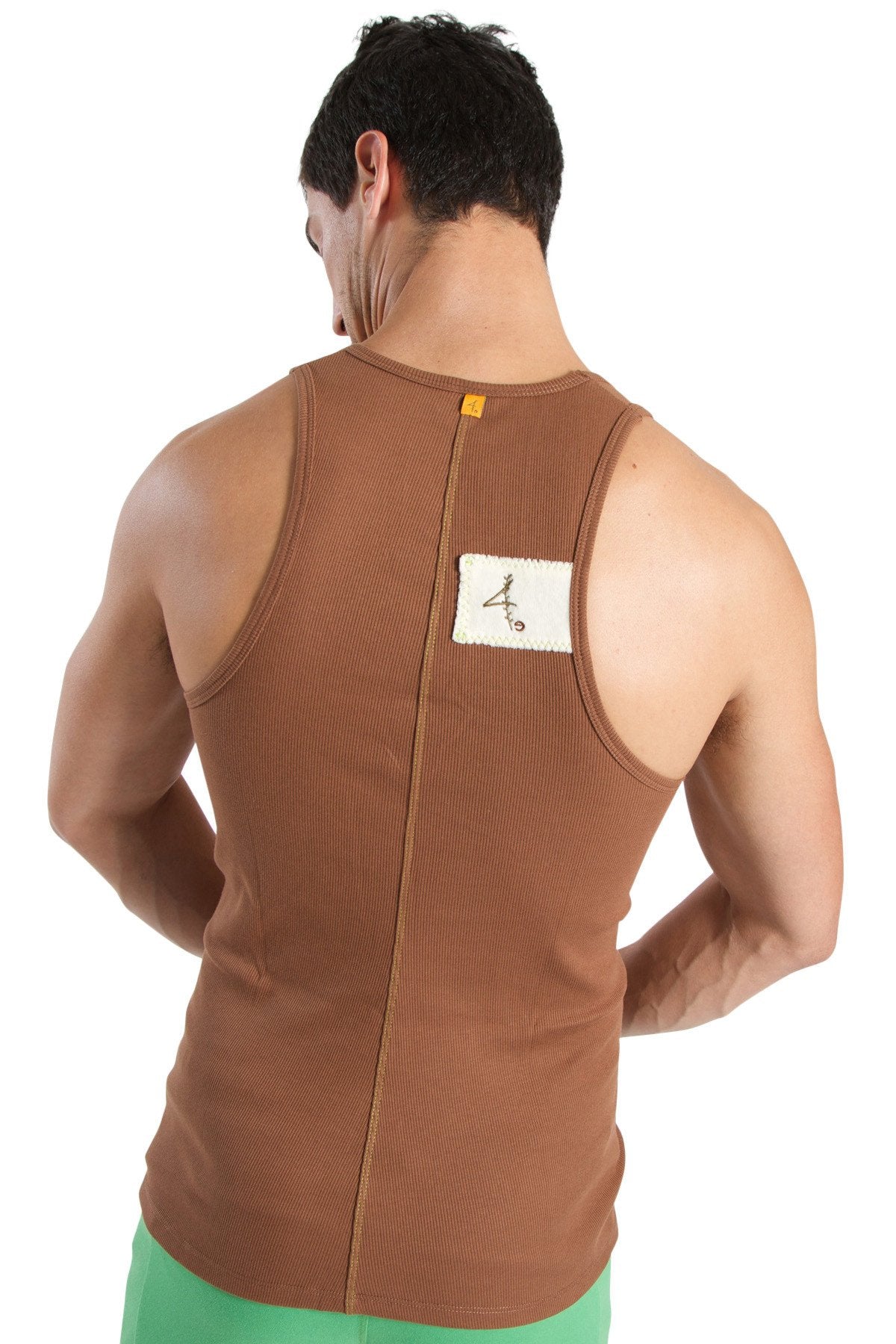 Back view of brown ribbed edge sustain tank top with white label in chocolate color made from sustainable fabric